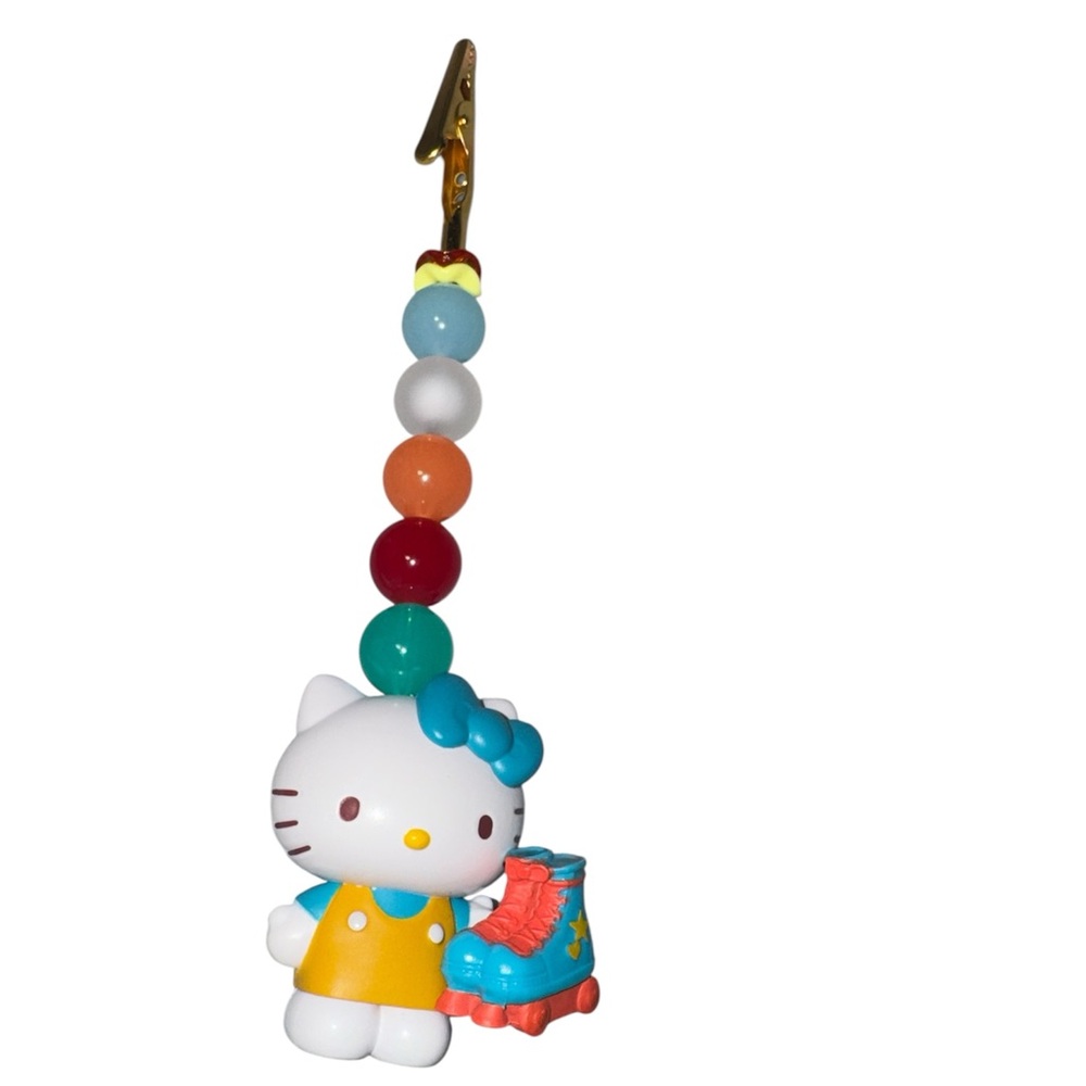 Hello Kitty Blue Bow Yellow Dress Roller Skate Charm it’s a card holder
